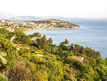 Sea bay near Stara Baska, in the back the village of Stara Baska, Island of Krk, Kvarner Gulf Bay, Primorje-Gorski kotar, Croatia, Europe