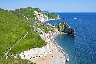 View over the chalk coast with the famous rock bridge Durdledoor, West Lulworth, Dorset, England Great Britain