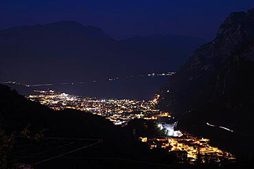 The town of Riva del Garde at night on Lake Garda in the municipality of Riva del Garda Trentino Northern Italy Europe