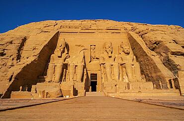 The incredible Abu Simbel Temple rebuilt on the mountain in southern Egypt in Nubia next to Lake Nasser. Temple of Pharaoh Ramses II, travel lifestyle