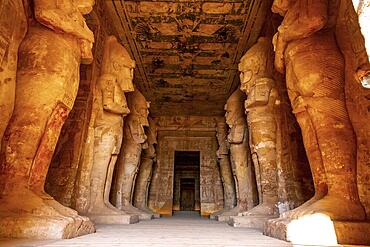 Interior with the sculptures of the pharaohs in the Abu Simbel Temple in southern Egypt in Nubia next to Lake Nasser. Temple of Pharaoh Ramses II, travel lifestyle