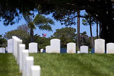 Generic view of a veterans cemetery on top of a hill showing American pride