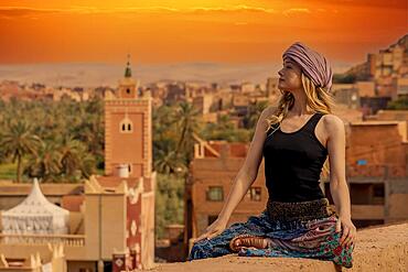 A gorgeous model poses outdoors in Morocco