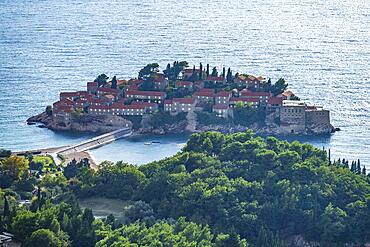 The small Adriatic island of Sveti Stefan near Budva, Montenegro, Europe