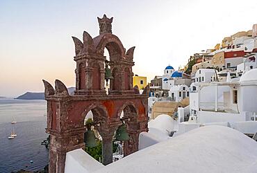 Old belfry wiith view of sea and caldera houses, Ia, Oia, Santorini, Greece, Europe