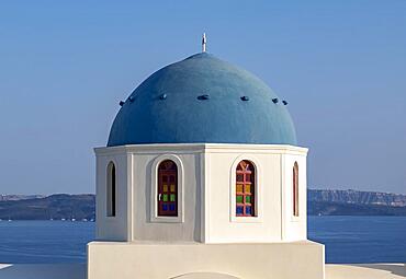 Close-up of blue dome of whitewashed church, Ia, Oia, Santorini, Greece, Europe