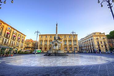 Early morning, HDR, super wide angle, obelisk, elephant, wide open space, blue sky, lanterns, almost deserted, Catania, east coast, Sicily, Italy, Europe