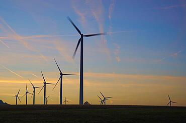 Wind turbines at dawn in the morning, Wertheim, Baden-Wuerttemberg, Germany, Europe