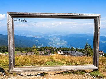 Wooden frame as photo motif, view from Gerlitzen Alpe towards Feuerberg and Ossiachersee, Gerlitzen Alpe, Carinthia, Austria, Europe