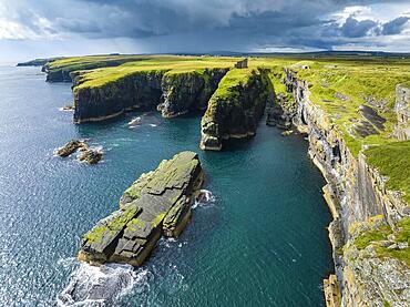 Aerial view of the ruined Castle of Old Wick surrounded by rugged cliffs on the North Sea coast, Wick, County Caithness, Scotland, United Kingdom, Europe