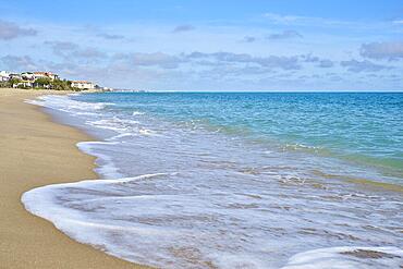 Breaking waves on a sandy beach, sunny, near Tarragona, Catalonia, Spain, Europe