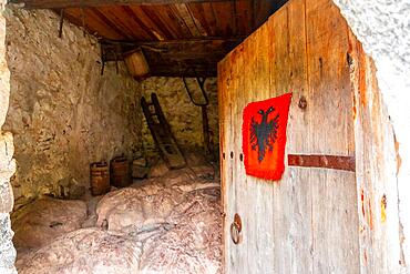 Entrance gate to Nikoll Koceku tower in the valley of Theth national park, Albania. albanian alps