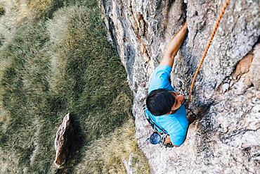 Man climbing wall