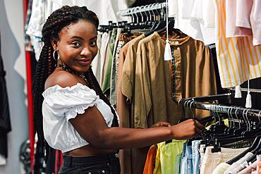 Woman store checking clothes