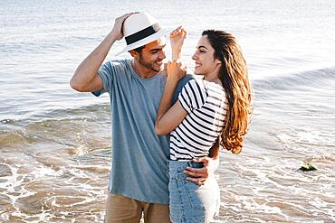 Young couple love beach