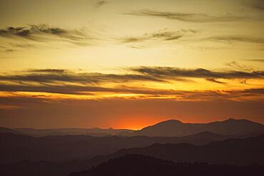 Beautiful sky yellow shades with mountains