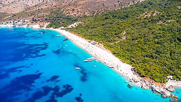 Aerial drone view of the paradise beach of Kroreza or Krorez on the Albanian riviera in Sarande, Albania. turquoise waters