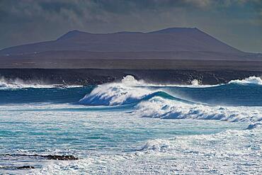 Surf waves, rocky coast at Los Hervideros, Lanzarote, Canary Islands, Canary Islands, Spain, Europe