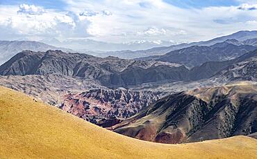 View over eroded mountainous landscape with brown hills, mountains and steppe, Chuy province, Kyrgyzstan, Asia