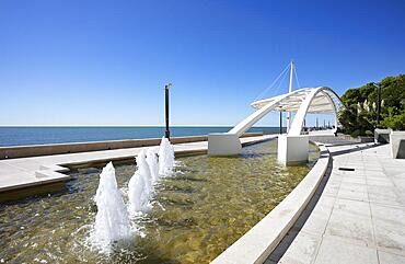 Modern fountain on the Nazario Sauro seafront, Grado, Friuli Venezia Giulia, Italy, Europe