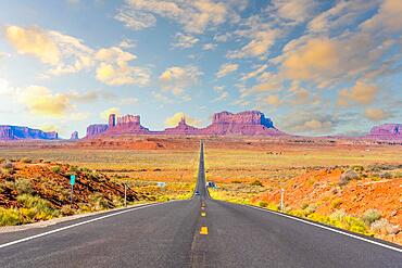 The Monument Valley road in sunset, the famous place where they filmed the Forrest Gum movie. Utah