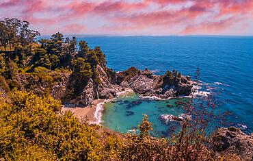 Mcway Waterfall and its beautiful beach in sunset, California. United States