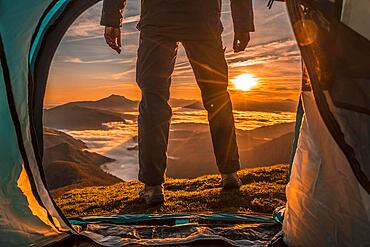 Orange sunrise from inside the tent. Basque Country