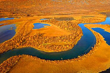 Drone shot, view of the valley Vistasvagge with the meandering river Vistasjakka and countless small lakes, birch forests, autumn, intense colouring, Nikkaluokta, Kiruna, Gaellivare, Norrbottens laen, Lapland, Northern Sweden, Sweden, Europe