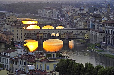 Ponte Vecchio in Florence, Italy at sunset