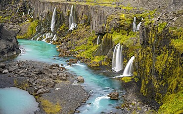 Waterfalls and a turquoise blue river flowing through a canyon, Sigöldugljúfur, long exposure, Icelandic highlands, Iceland, Europe