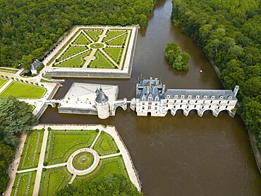 Aerial view of a French castle on the river Cher with neighbouring geometric castle park and green trees, Chenonceau Castle, Château de Chenonceau, moated castle, Chenonceaux, France, Europe