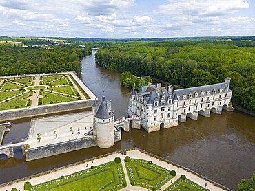 Aerial view of a castle on the river Cher with surrounding geometric gardens and forest landscape, Chenonceau Castle, Château de Chenonceau, moated castle, Chenonceaux, France, Europe