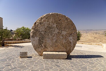 Rolling stone as a fortified Tor tor of a Byzantine monastery in the ancient village of Faysaliyah, known as Kufer Abu Badd, Mount Nebo (Jabal Nībū), Saint Mountain of Moses, Abǎrim Mountains, Jordan, Asia