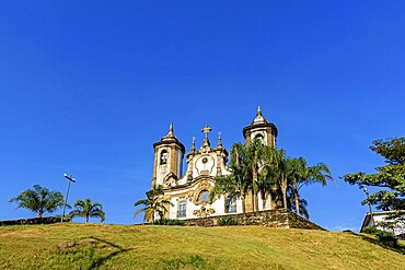 Old baroque church and its towers on top of the hill in the historic city of Ouro Preto in Minas Gerais, Brazil, Ouro Preto, Minas Gerais, Brazil, South America