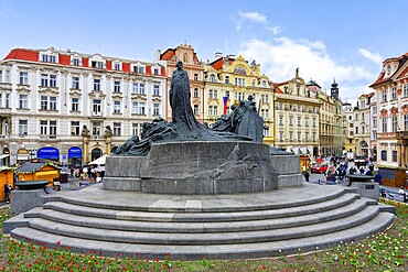 Memorial to the 15th century theologian and philosopher Jan Hus, Old town Square during a popular festival, Prague, Bohemia, Czech Republic, Europe