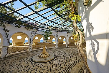 Inner courtyard of a circular building with glass roof, plants and benches, down to earth with mosaic tiles, thermal springs, thermal baths, thermal baths of Kallithea, Kallithea, Rhodes, Dodecanese, Greek Islands, Greece, Europe