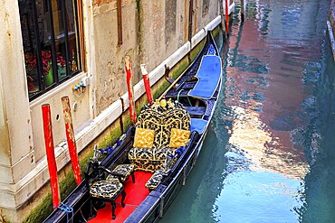 Luxury Gondola waiting for tourists near Rialto Bridge in Venice