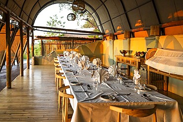 Set table in the restaurant, Okuti Camp, Moremi Game Reserve, Okavango Delta, Maun, Botswana, Africa