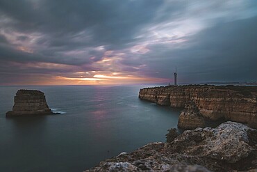 Long exposure, sunset, sea, lighthouse, Algarve, Portugal, Europe