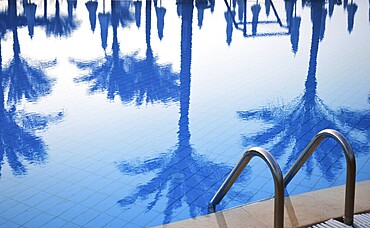 Swimming pool in touristic resort during summer time