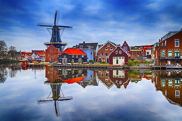Windmill and traditional houses in Haarlem, Holland, Netherlands