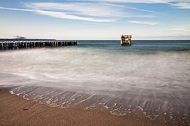 Groyne and jetty remains on the coast of the Baltic Sea