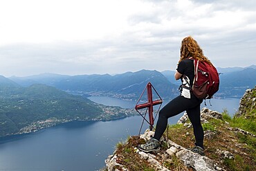 Trekking scene on Lake Como alps in spring