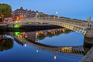 The famous Ha'penny Bridge in Dublin, Ireland, at night, Europe