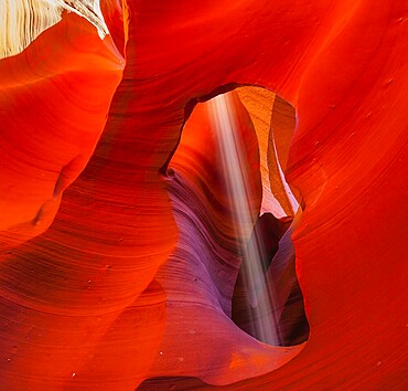 Famous midday sun ray in slot canyon Antelope. The Navajo reservation in Arizona, USA, North America