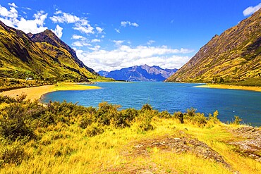 Great trip to a fabulous country. Huge Hawea Lake with turquoise smooth water. The steep slopes of the mountains descend into cold water. The concept of ecological, active and photo tourism