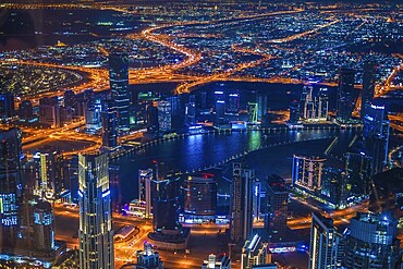 Dubai night view seen from the observation deck of Burj Khalifa. Shooting Location: Dubai