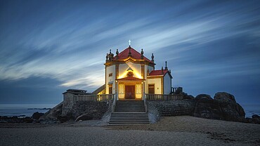 Capela do Senhor da Pedra chapel on the coast of the sea