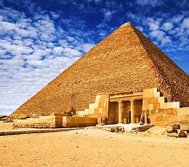 Egyptian pyramid in Giza. Architectural heritage of ancient Egyptian civilization. Ruins and statues of ancient Egypt