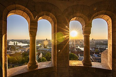 Old historic fortress and church at sunrise. City panorama at dusk. View of the Danube Fishermen's Bastion, Halászbástya, Budapest, Hungary, Europe